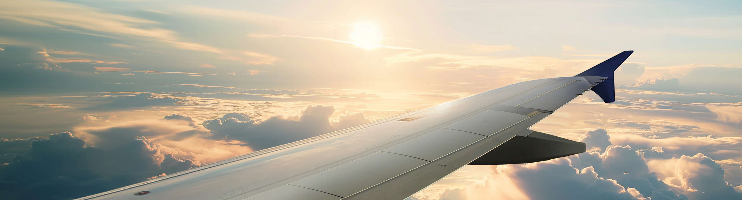 Looking out over the clouds in a Braathens Airbus 320.